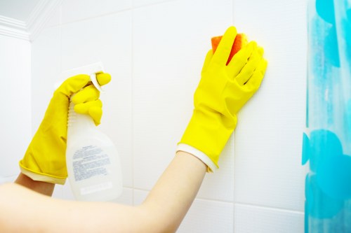 Cleaners working responsibly in a tidy, hazard-free environment
