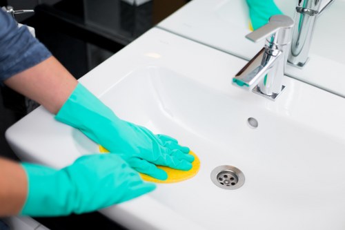 Professional Finchley cleaners working in a bright modern space